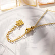 Style BUCKIE : Collier avec plusieurs pendentifs et chaîne en zircone.
