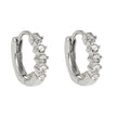 PORTREE : Mini boucle d'oreille classique à zircone incrustée en or blanc argenté.