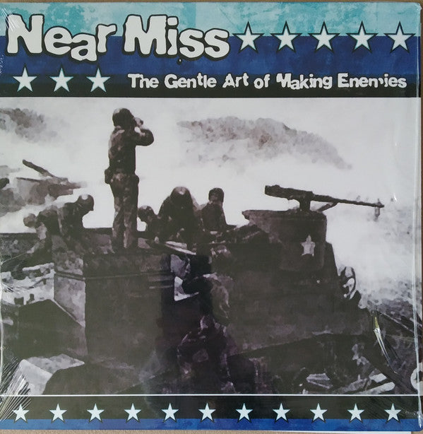 Near Miss / The Gentle Art Of Making Enemies - LP Blue and white (Used)