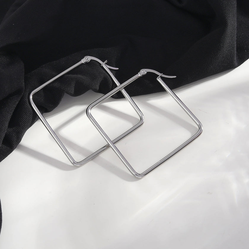 REILYNN: Square Silver Hoops - A Bold Twist on Classic Elegance