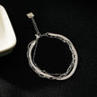 REINEDA: Triple Stacked White Gold (Silver Toned) Bracelet