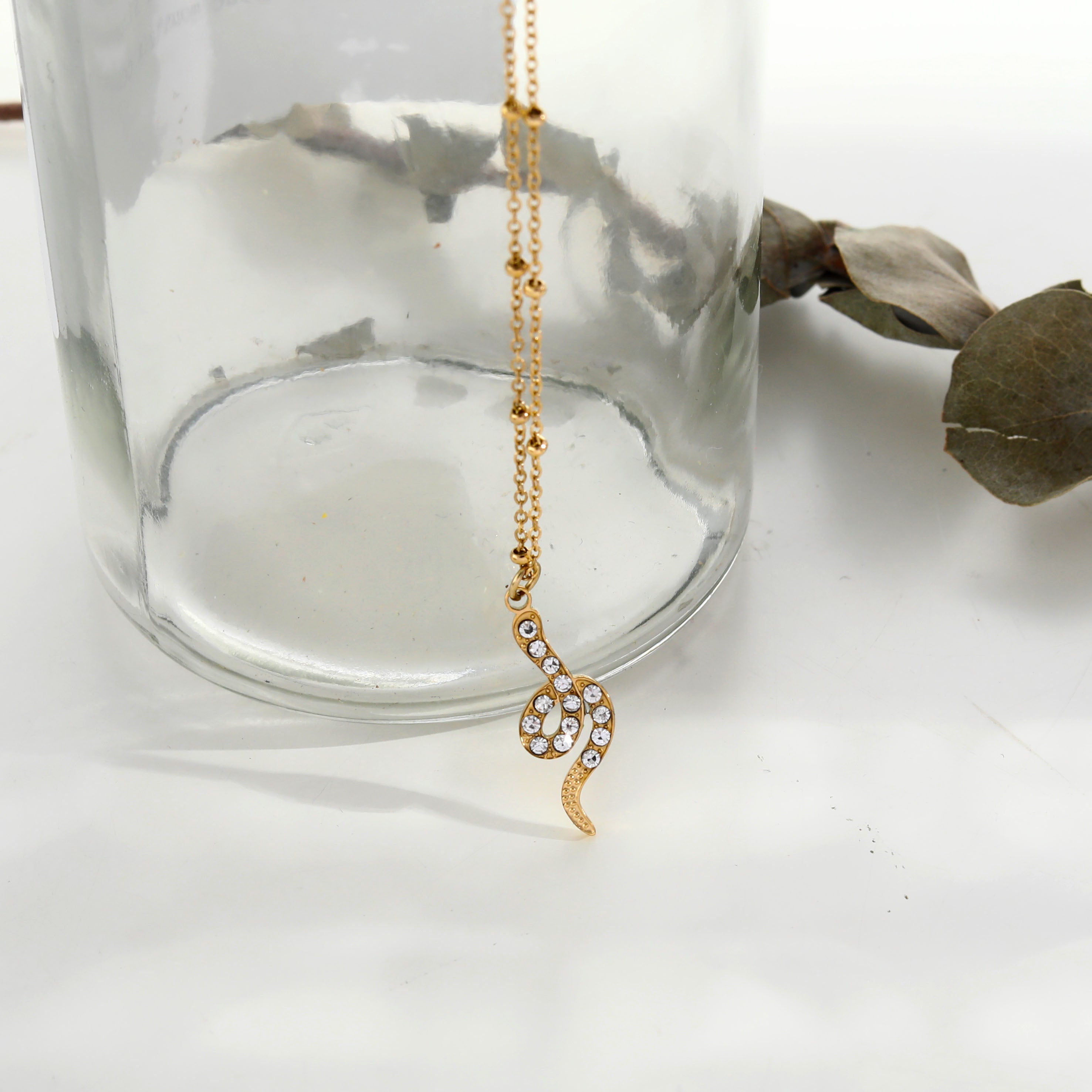 RIHANNA Beaded Chain Necklace with a Pavé Zirconia Serpent Pendant in Gold