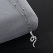 Collier RIHANNA à chaîne perlée avec pendentif serpent en zircone pavée, en argent.