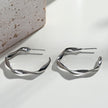 RIMINI Silver (White Gold): Sculpted Twist Hoop Earrings