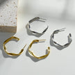 Boucles d'oreilles en forme de sculpture ADAMMA