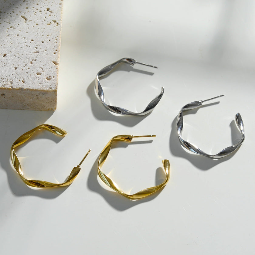 Boucles d'oreilles en forme de sculpture ADAMMA