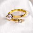 RIZALINA: Classic Band Ring Anchoring Heart Shaped & Rounded Zirconia Gemstones