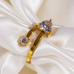 RIZALINA: Classic Band Ring Anchoring Heart Shaped & Rounded Zirconia Gemstones