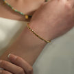 SAFIYA : Élégance tordue - Bracelet en corde réglable avec perles rondes.