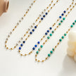 SANTA CRUZ Blue : Collier chaîne avec perles dorées et pierres naturelles.