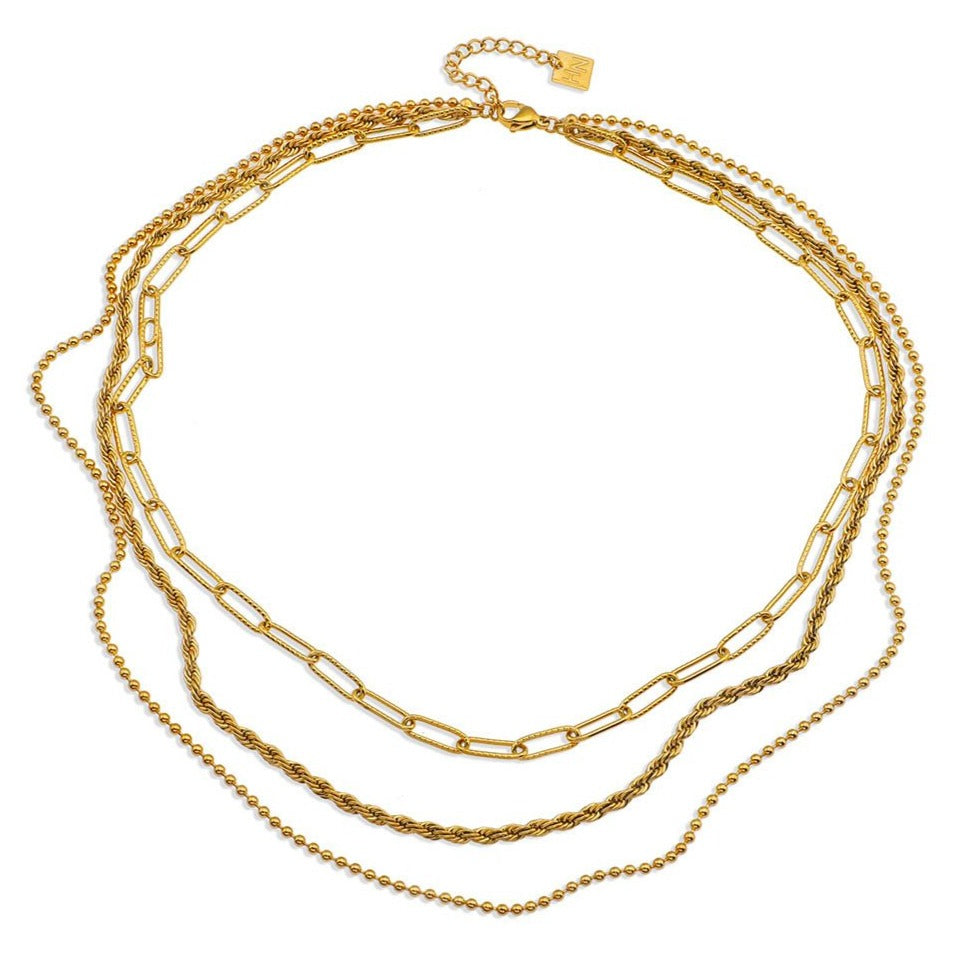 SELENE : Collier en or à trois rangs de chaînes mixtes