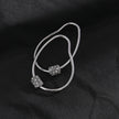 Boucles d'oreilles créoles en argent SIMAN ornées de zirconiums pavés de forme irrégulière.