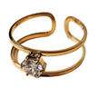 SINTA : Bague minimaliste à double anneau avec zircone solitaire au centre.