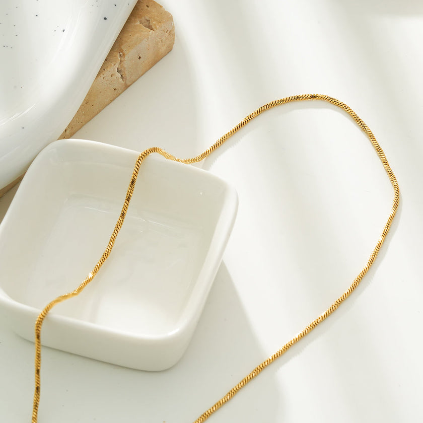 SKAGWAY: Minimalist Twisted Textures Chain Necklace in Gold