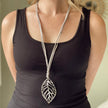 Suede Necklace With Leaf Pendant In Silver Plate