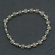 Elasticated Flower Bracelet In Silver Plate