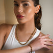 Style SUTTON : Collier ras-de-cou à maillons cubains en or.