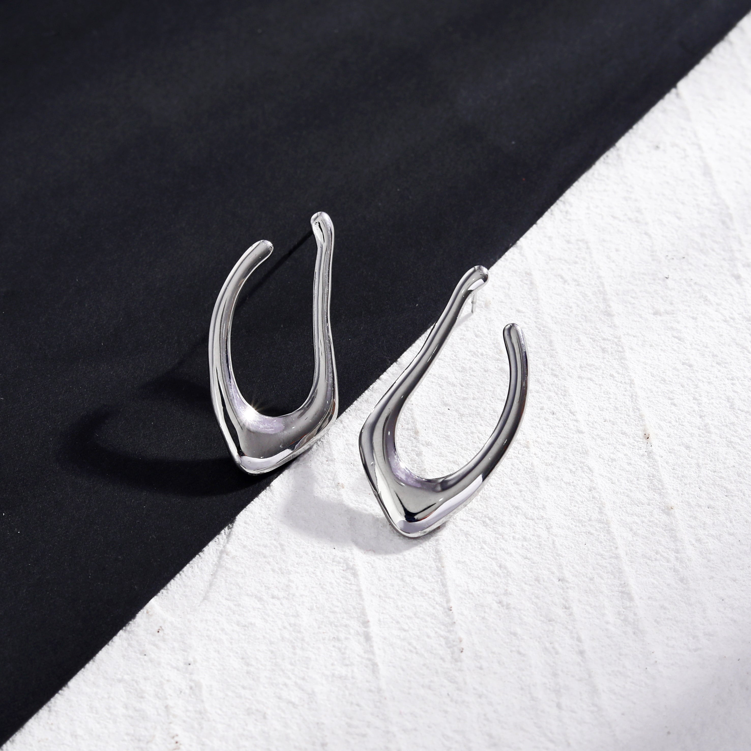 TARAJI Abstract Shaped Hoop Earrings in Silver