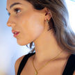 Style TENDER Or : Mini boucles d'oreilles en forme de cœur serties de zircons pavés.