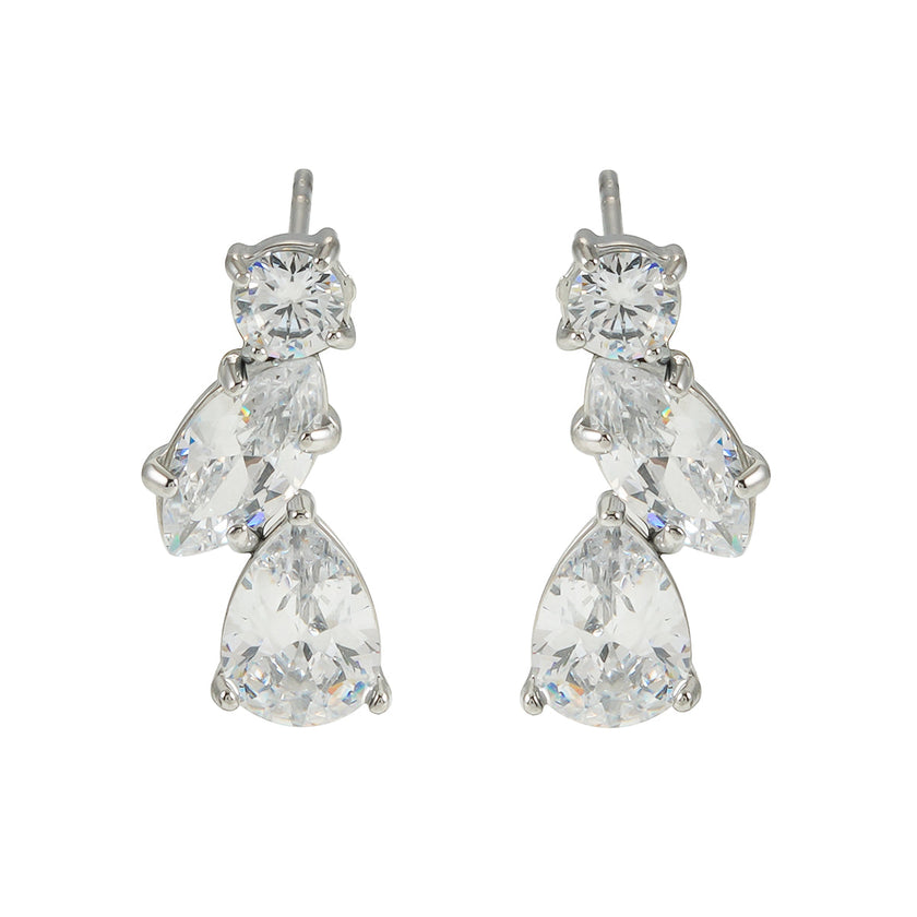 THEOLA : Boucles d'oreilles créoles en forme de pile de trois moissanites, effet éclatant, en or blanc argenté.
