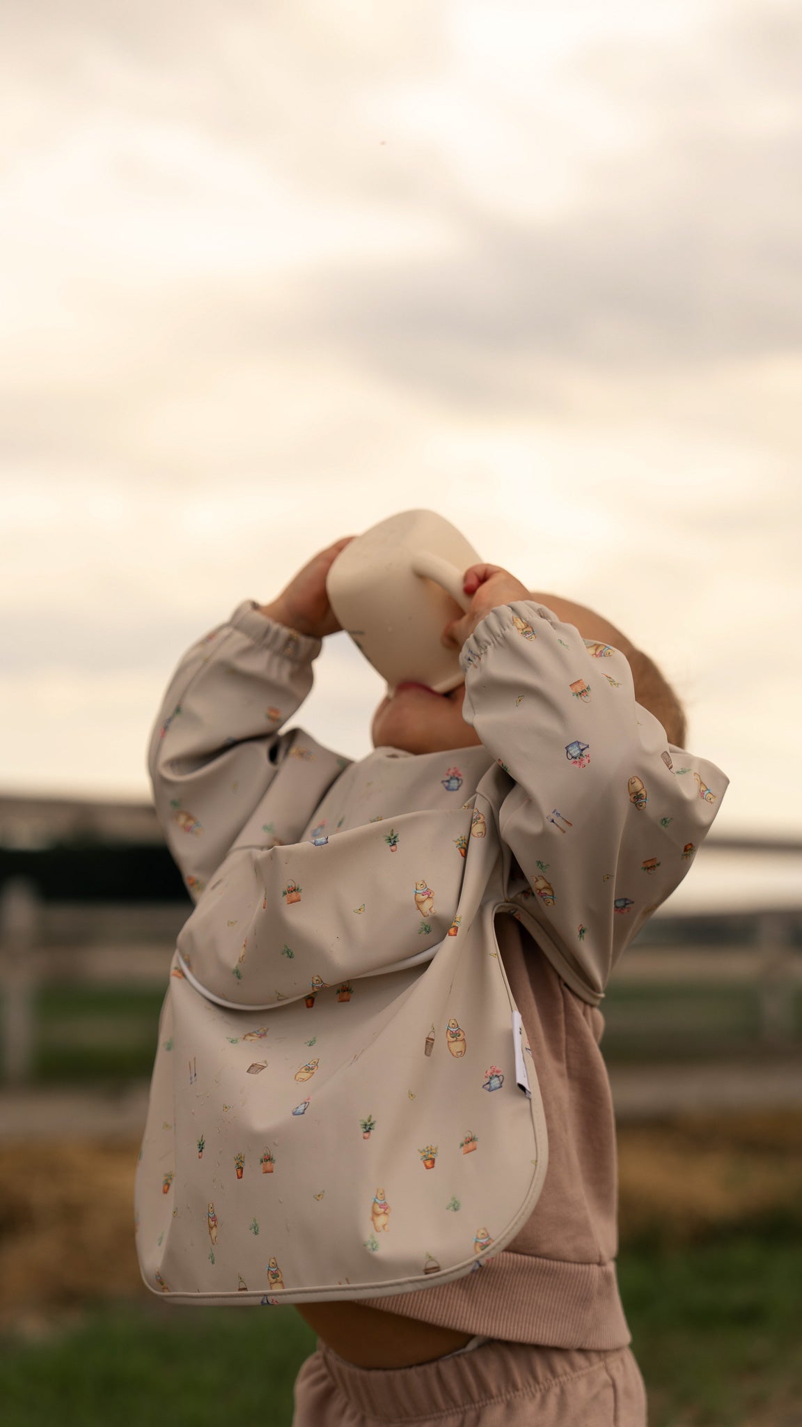 Bavette à manches longues imperméable avec poche | 6-24 mois