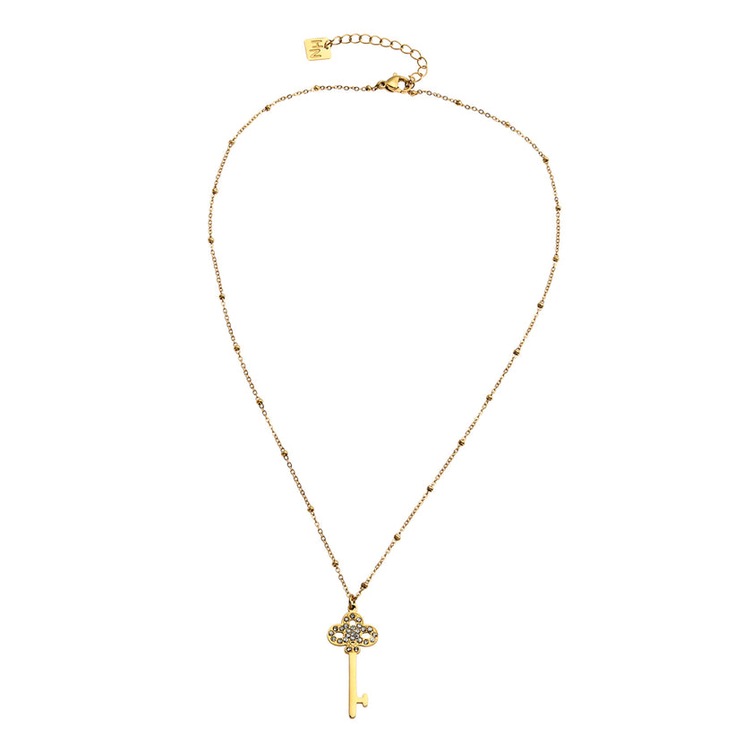 Collier UNLOK en or perlé avec pendentif clé orné de zircons.