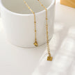 URIKA Beaded Chain Necklace with  Zirconia Pavé Triangle Pendant in Gold