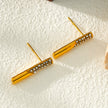 VOLTAMI Or : Boucles d'oreilles minimalistes à barre sertie de zirconiums pavés.