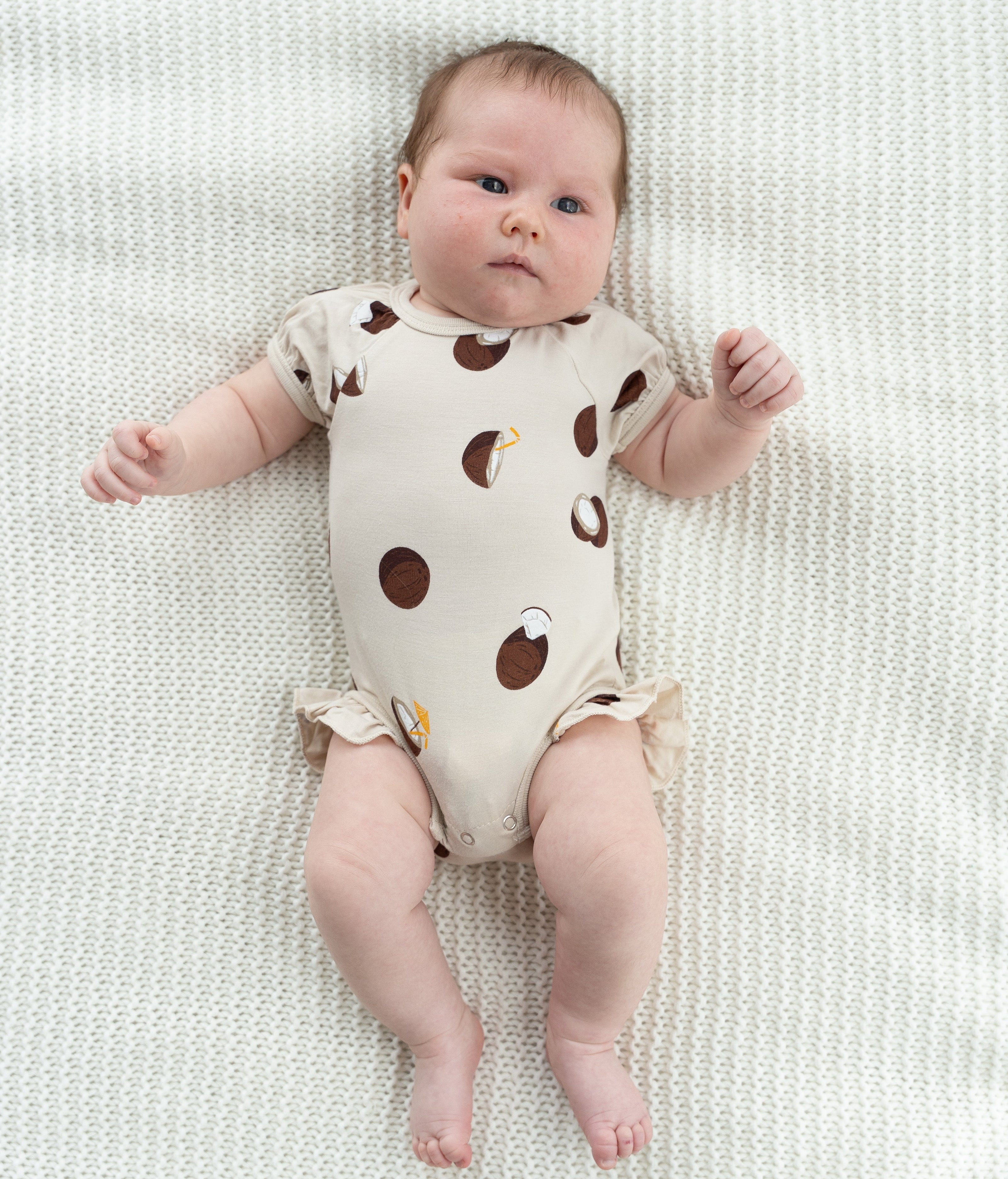 Bamboo Short Sleeve Ruffle Onesie (Coconut Print)