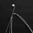 Collier ZURI à trois rangs de chaînes mixtes en argent.
