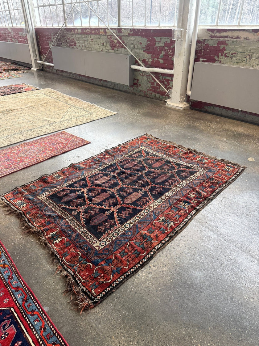 Antique Persian Bakhtiari Rug | 5' x 7’ 4