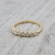 Bague semi-éternité courbe en or 14K - 18K ou platine et diamants