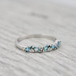 Bague semi-éternité Marquise diamants et aigues-marines