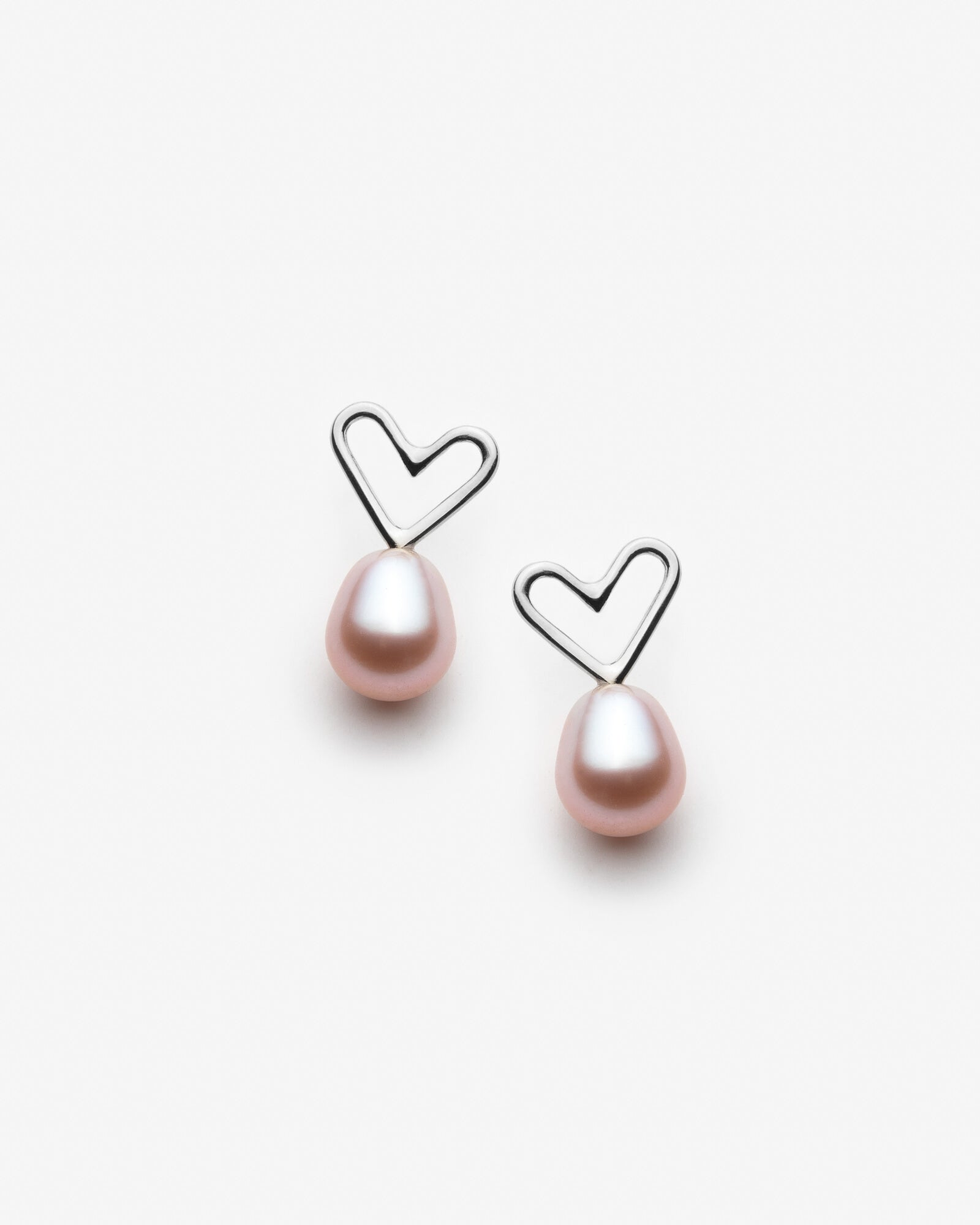 Boucles d'oreilles coeurs avec grosses perles roses