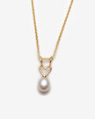 Collier avec breloque coeur et grosse perle blanche