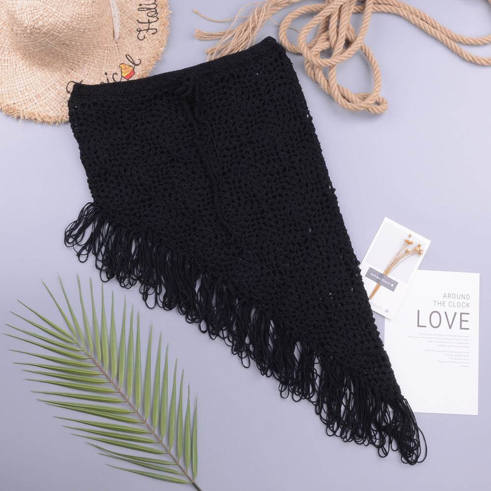 European And American Women's See Through Hollow Knitted tassel fringe Slant Beach Skirt