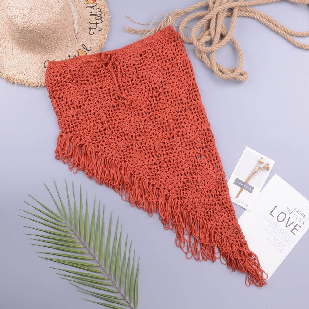 European And American Women's See Through Hollow Knitted tassel fringe Slant Beach Skirt