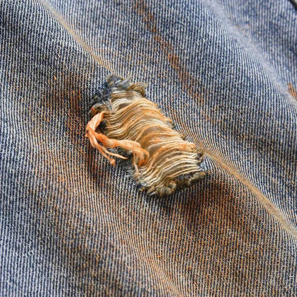 Dirty Ripped Jeans With Waste Soil