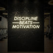 DISCIPLINE BEATS MOTIVATION Neon Sign