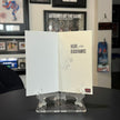 HEART OF THE BLACKHAWKS SOFTCOVER BOOK SIGNED BY PIERRE PILOTE - AUTOGRAPHED HOCKEY MEMOIR 9 X 6 INCHES - CHICAGO HOCKEY LEGEND COLLECTIBLE MEMORABILIA