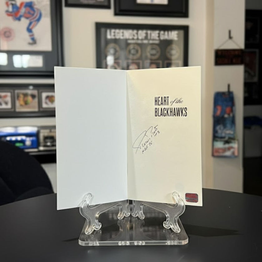 HEART OF THE BLACKHAWKS SOFTCOVER BOOK SIGNED BY PIERRE PILOTE - AUTOGRAPHED HOCKEY MEMOIR 9 X 6 INCHES - CHICAGO HOCKEY LEGEND COLLECTIBLE MEMORABILIA