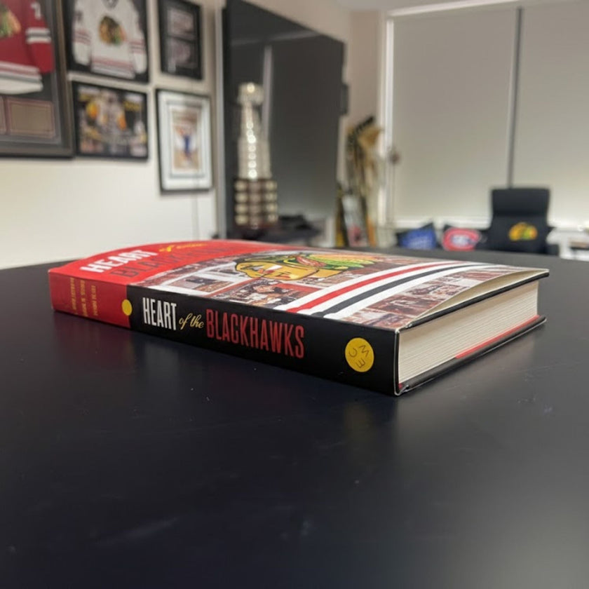 HEART OF THE BLACKHAWKS SOFTCOVER BOOK SIGNED BY PIERRE PILOTE - AUTOGRAPHED HOCKEY MEMOIR 9 X 6 INCHES - CHICAGO HOCKEY LEGEND COLLECTIBLE MEMORABILIA