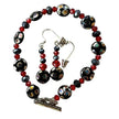 Bracelet et boucle d'oreille boules