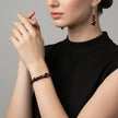 Bracelet et boucle d'oreille noir et rouge