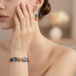 Bracelet et boucle d'oreille en pierre