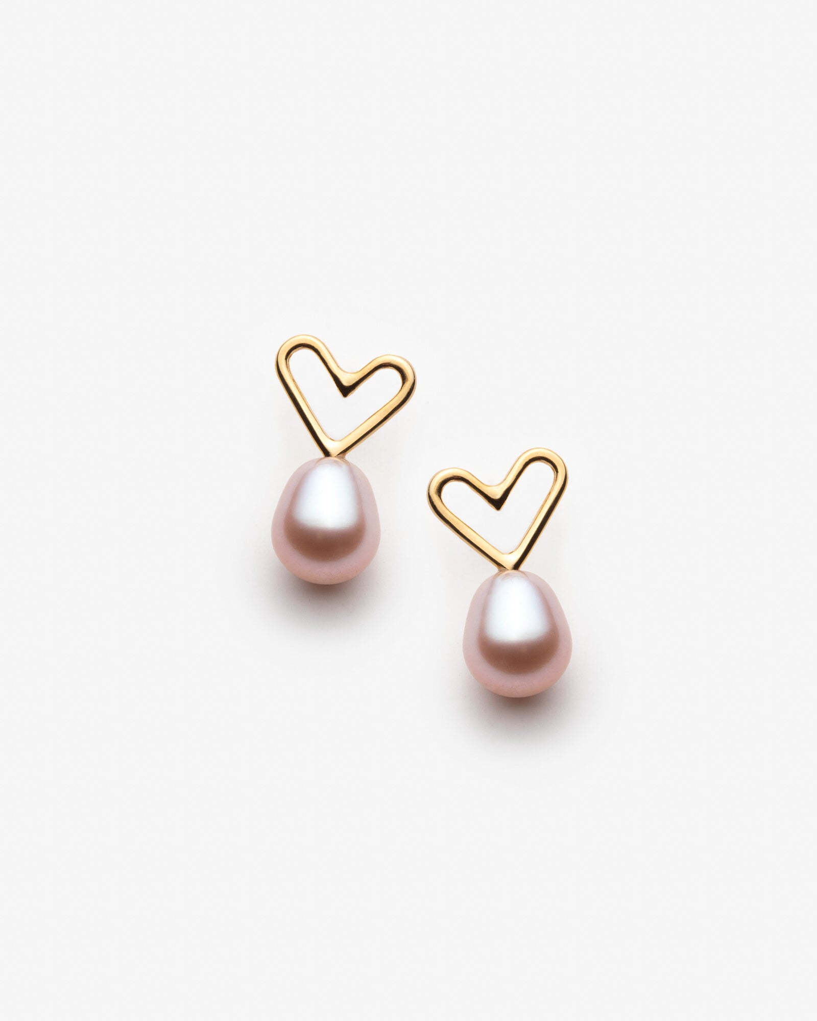 Boucles d'oreilles coeurs avec grosses perles roses