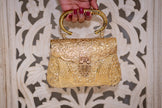 SAYA Golden Clutch