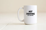 Not thriving just surviving mug