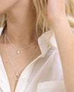 petit collier avec pendentif perle blanche