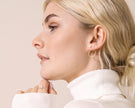 ear jackets avec perles blanches